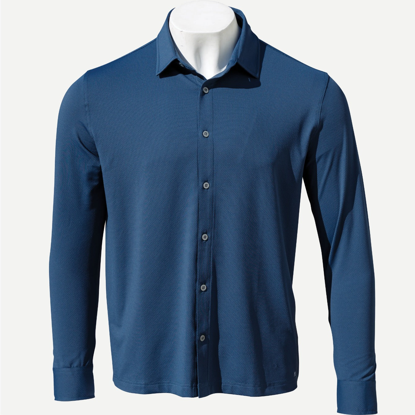 lightweight navy button down shirt for outdoor activity and golf shot on blank background. made with breathable lightweight fabric