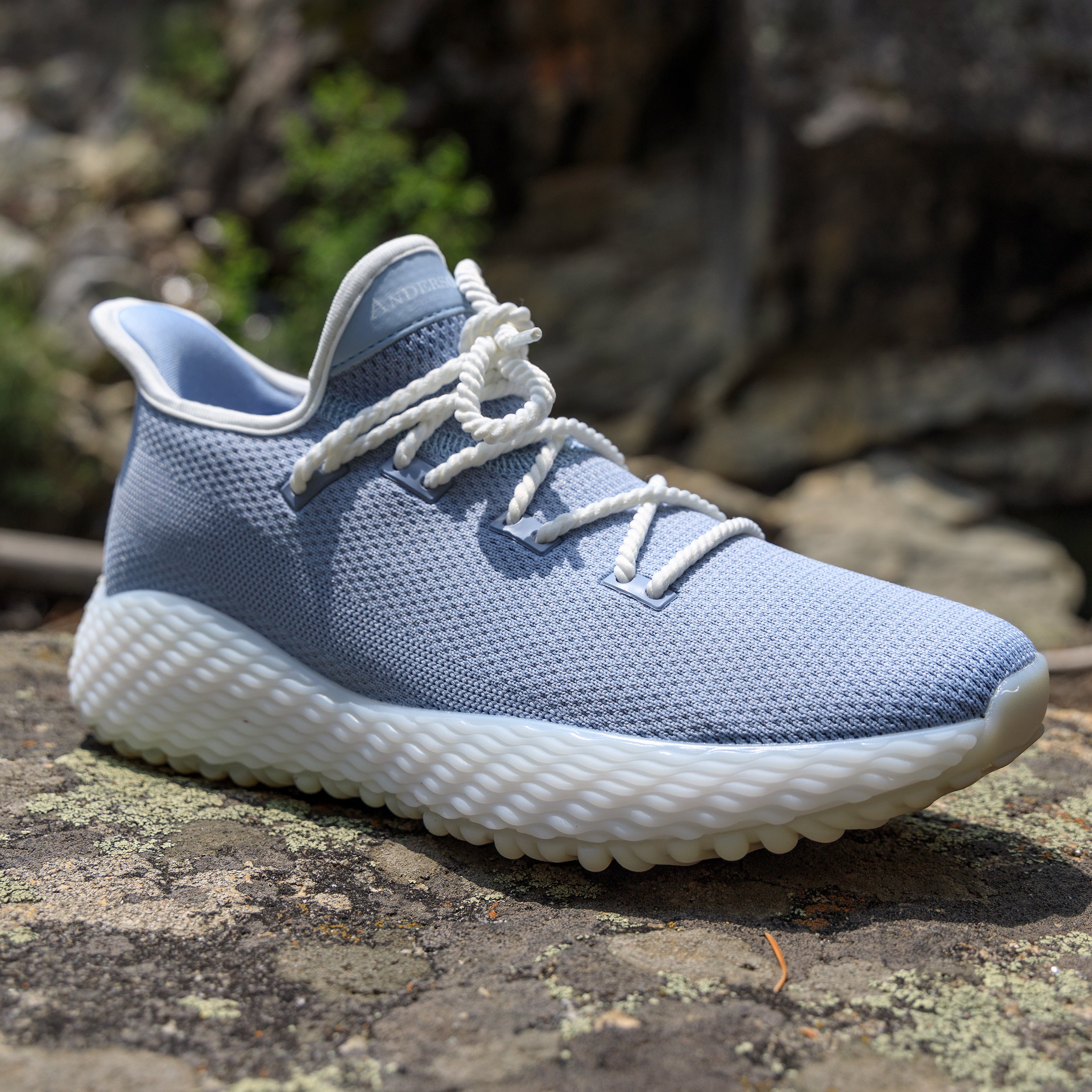 outdoor running shoe in light blue. The perfect shoe for hiking, golfing, pickleball, and the perfect shoe for anything. Light blue golf shoe with white laces. AO Wave1, the Ultimate Crossover Performance Shoe