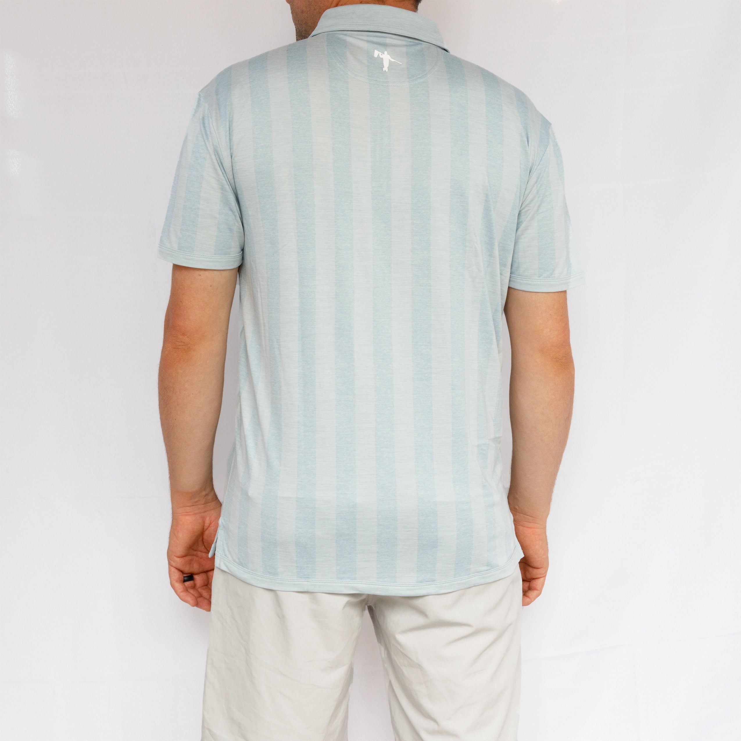 Man wearing athletic golf polo on blank background. Mens Golf Polo in LIght Blue with Vertical Stripes. Mens Fashion Luxury Golf Polo. AndersonOrd Golf Polo for Men